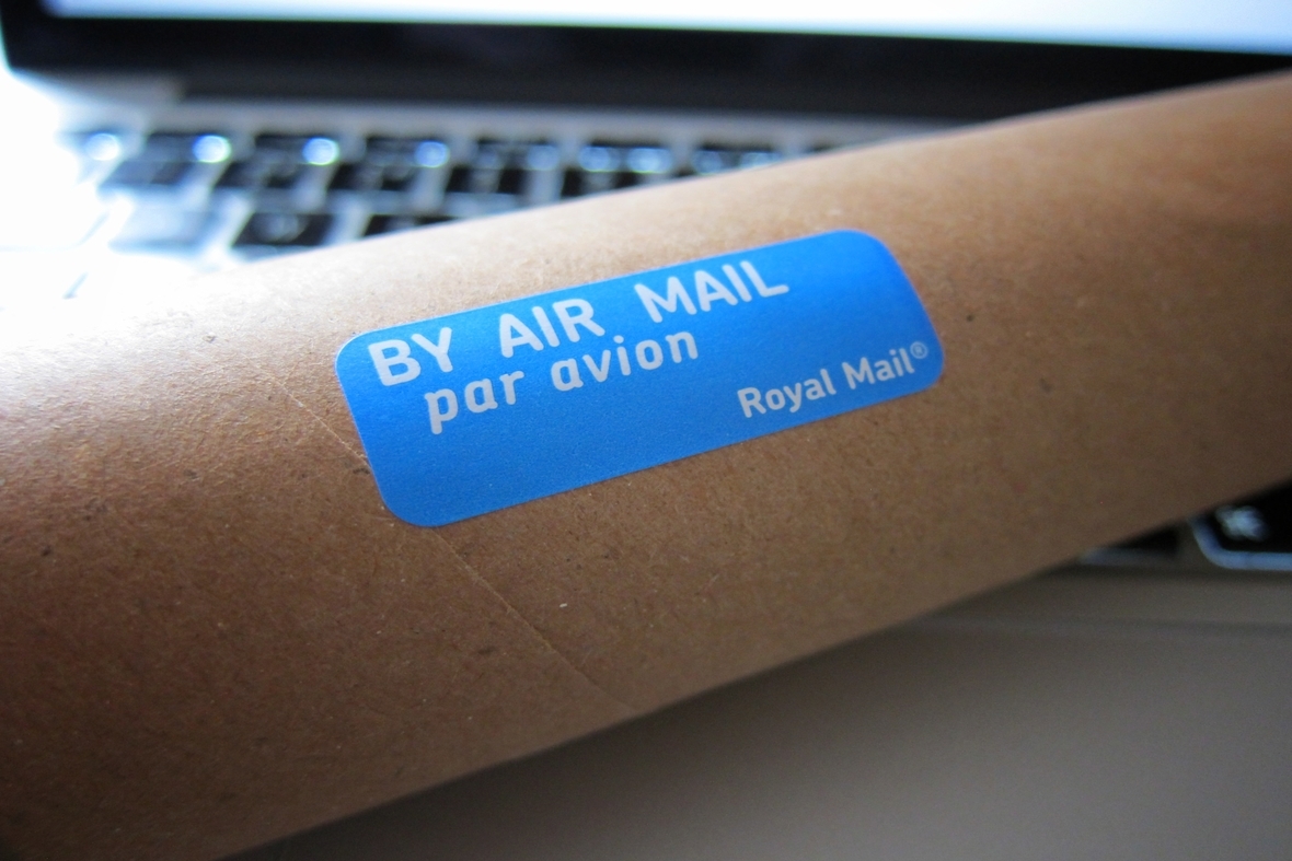 Post and parcel management - parcel on keyboard